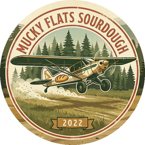 Mucky Flats Sourdough — plane with bread logo